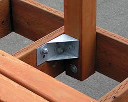 decklok deck bracket mounted to railpost